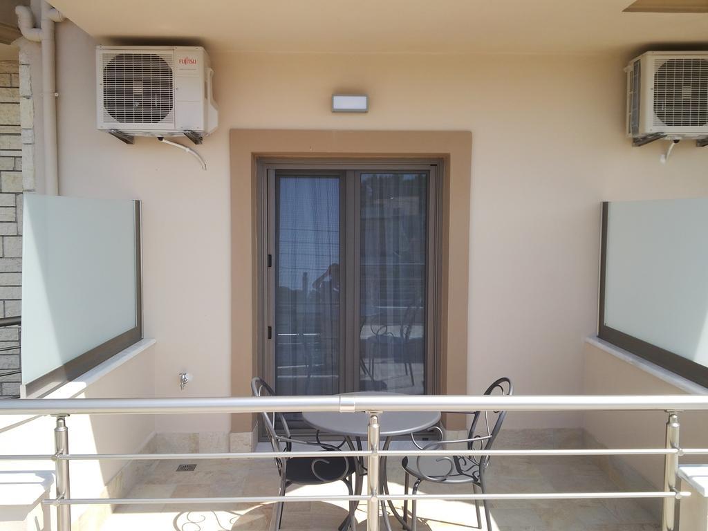 Aktaia Boutique Hotel Ammoudia Quarto foto